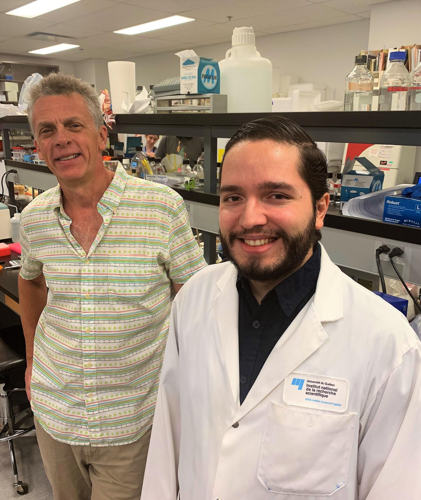 Albert Descoteaux and Guillermo Arango Duque in their laboratory at the Institut National de la Recherche Scientifique (INRS)