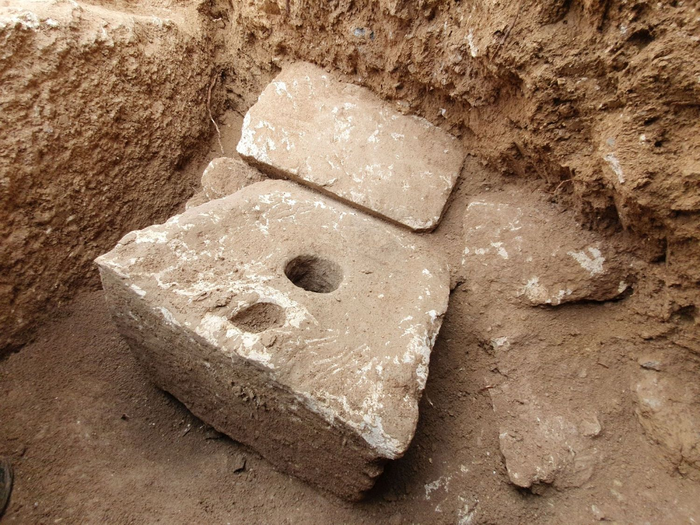 The 2700-year-old toilet seat made of stone.