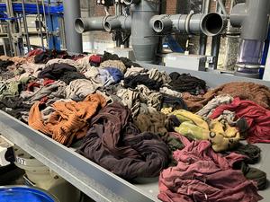 Polyester residue of postconsumer polycotton waste textiles after processing