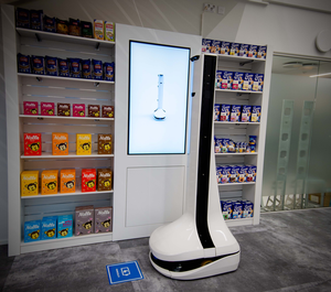 Wireless charging of a retail robot at a test site.