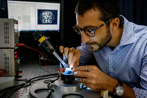 NTU Asst Prof Matteo Seita analysing a piece of 3D printed alloy using a prototype imaging system