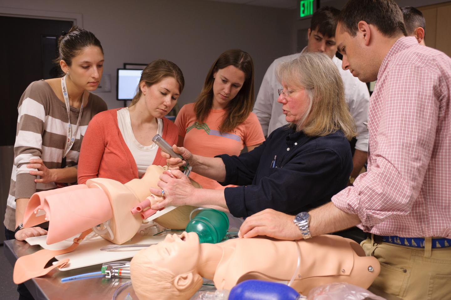 Maine Track MD Students and Professor in a Simulation Clinic