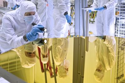 Engineer Examines Webb Telescope Primary Mirror EDU
