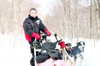 Young Cancer Patient with a Dog Sled