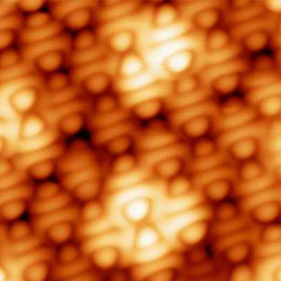 Topographic STM Images of a TCNQ Monolayer on Graphene/Ru