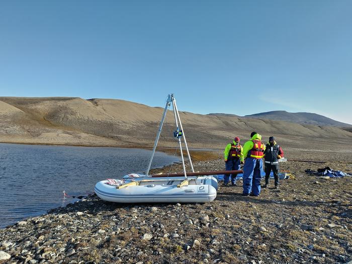 The floating platform used to take sediment cores from the bottoms of the lakes.