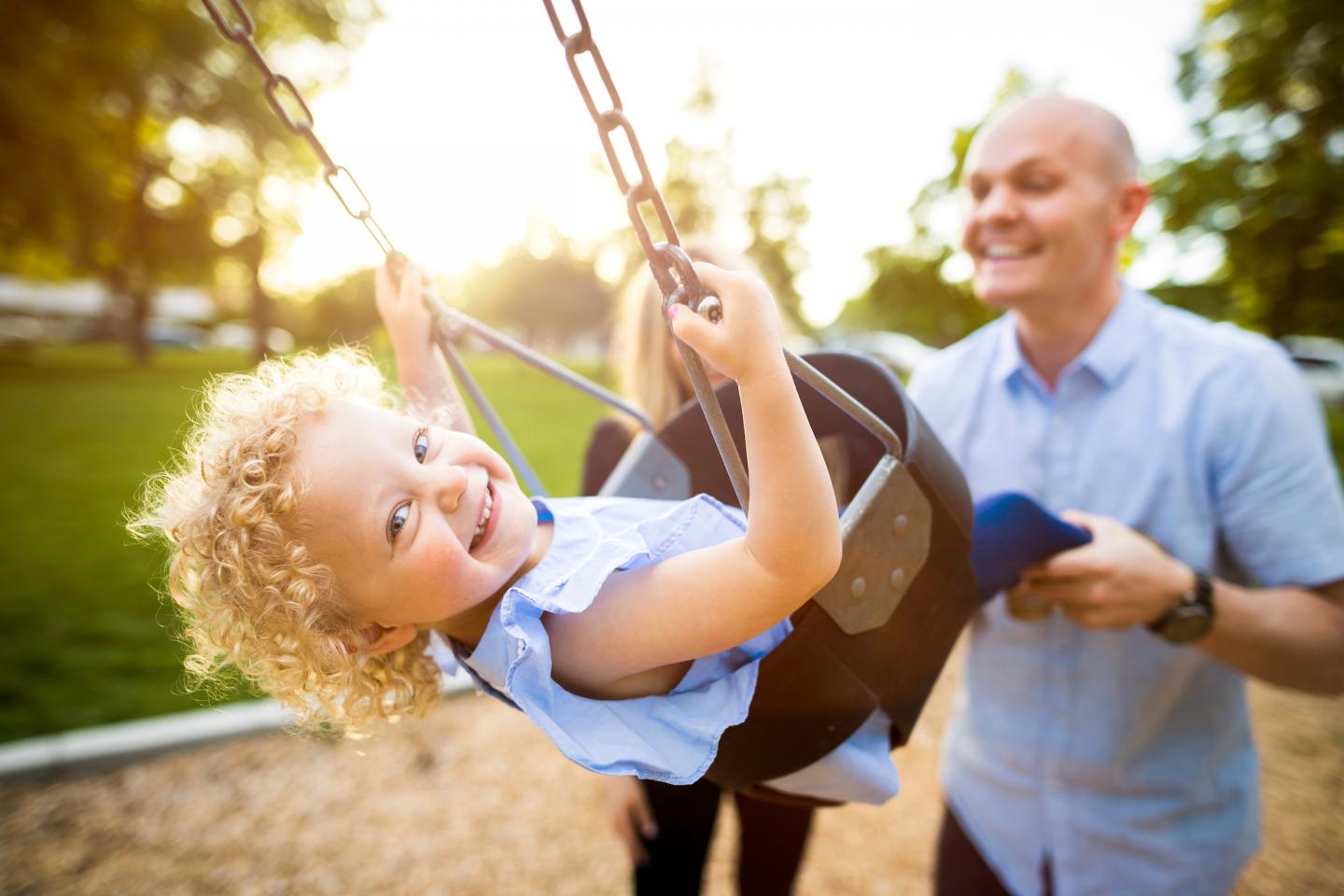 Dad and Daughter at Swingset
