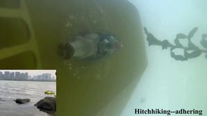 Adhesion and crawling of the Climbot on the ship's bottom surface in a river