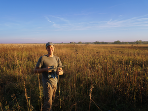Evan Thaler, one of the study’s authors, extracting soil cores from Doolittle Prairie, Iowa.