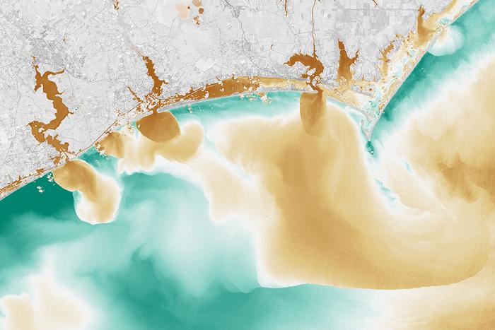 A NASA image containing visible and infrared data revealing the presence of dissolved organic matter – including potential antibiotic-resistant pathogens – in the waterways along coastal North Carolina after Hurricane Florence.