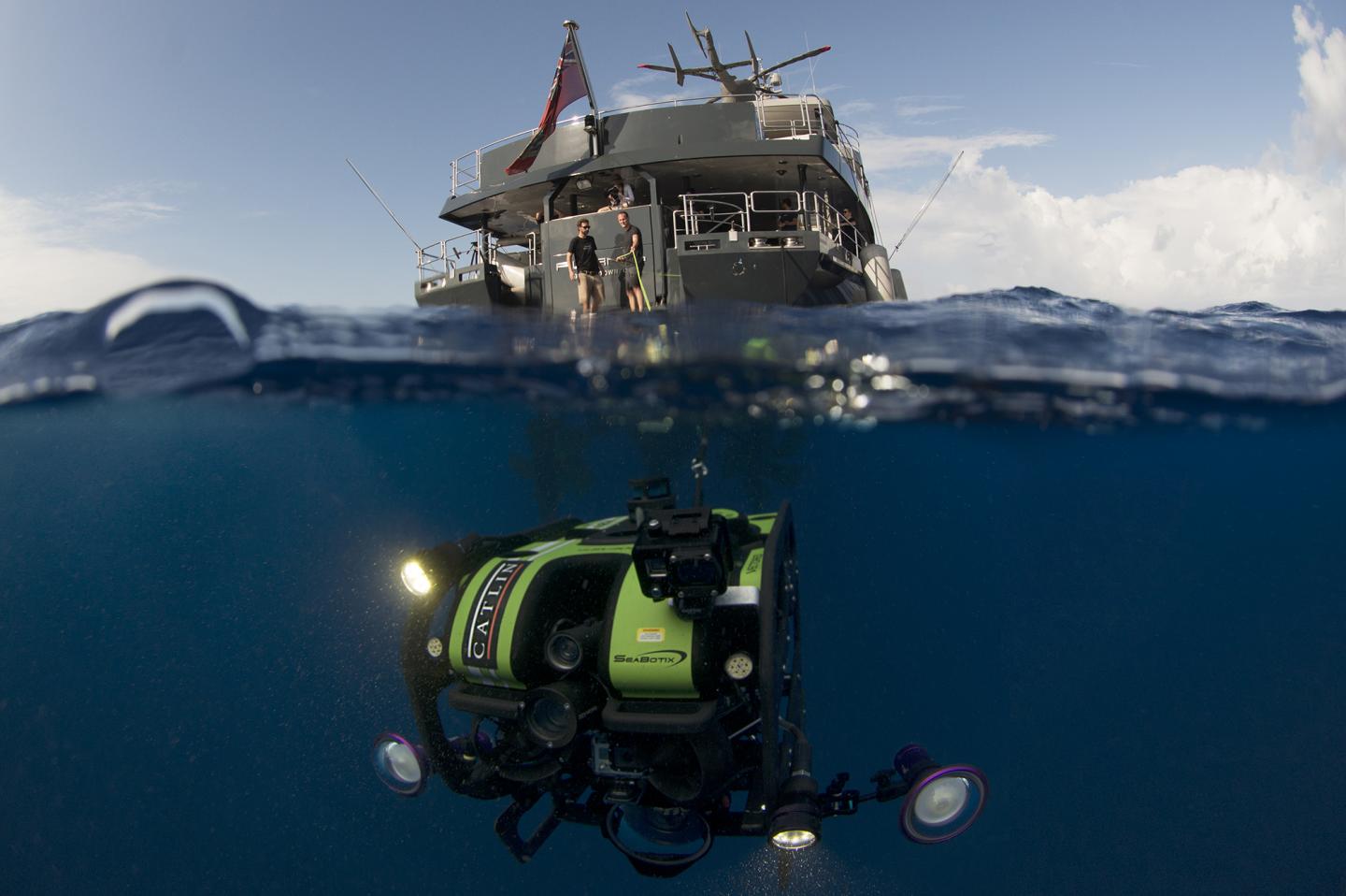 Academy researcher Pim Bongaerts deploys a remotely operated vehicle
