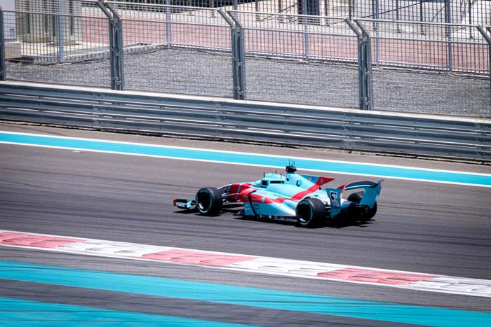 Team Kinetiz AI-driven Super Formula SF23 car racing on the Yas Marina F1 Circuit