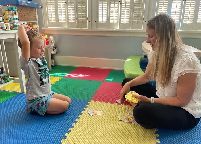 Kate playing with son