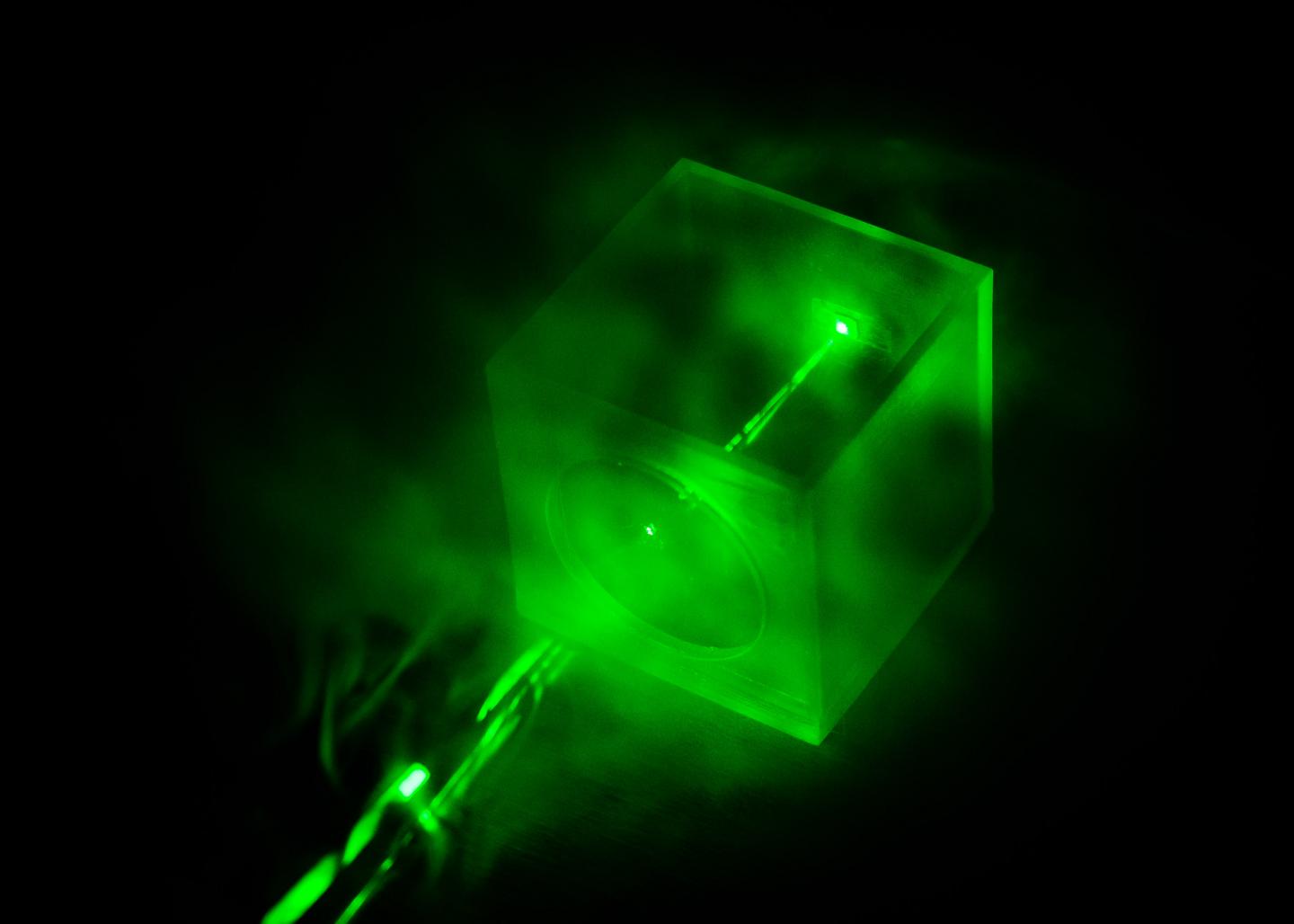 A Laser Shining on the Special Chip Designed by the NTU Researchers