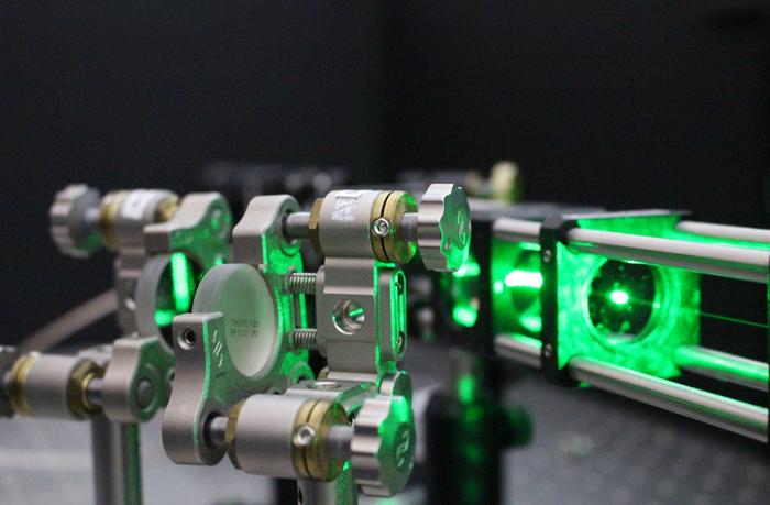Image shows a laser beam in Gavin Morley’s lab probes the quantum properties of a diamond.    Credit: Gavin Morley