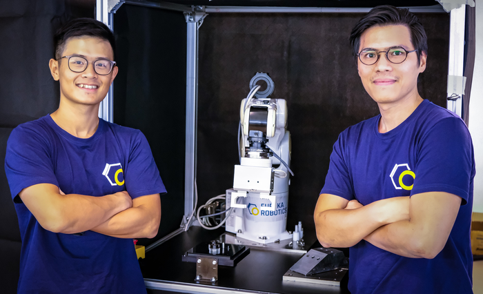 NTU Singapore Assoc Prof Pham Quang Cuong (right), co-founder of Eureka Robotics and Dr Hung Pham (left), co-founder and Chief Technology Officer of Eureka Robotics