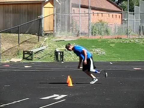 Slow Motion Movie of a Paralympic Sprinter Running with a Left Leg Prosthesis