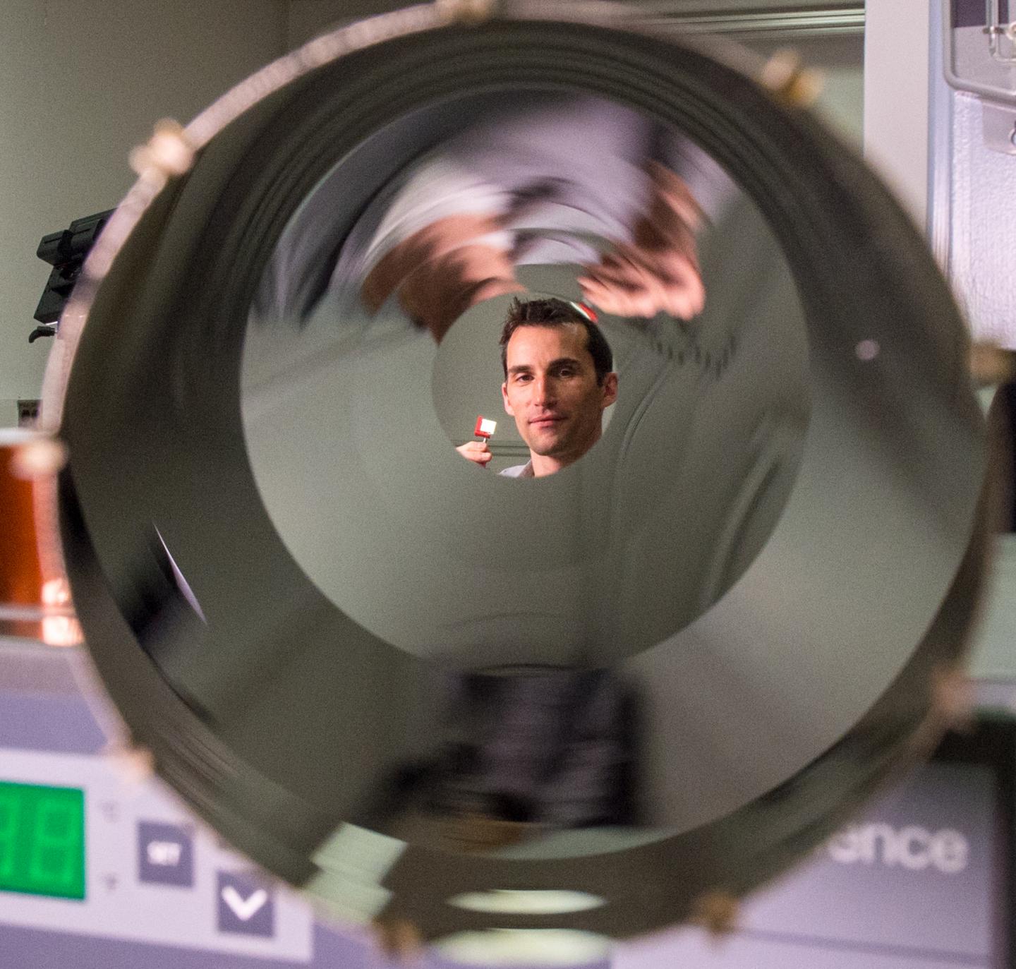 Steven Christe Holding a Cadmium Telluride Detector