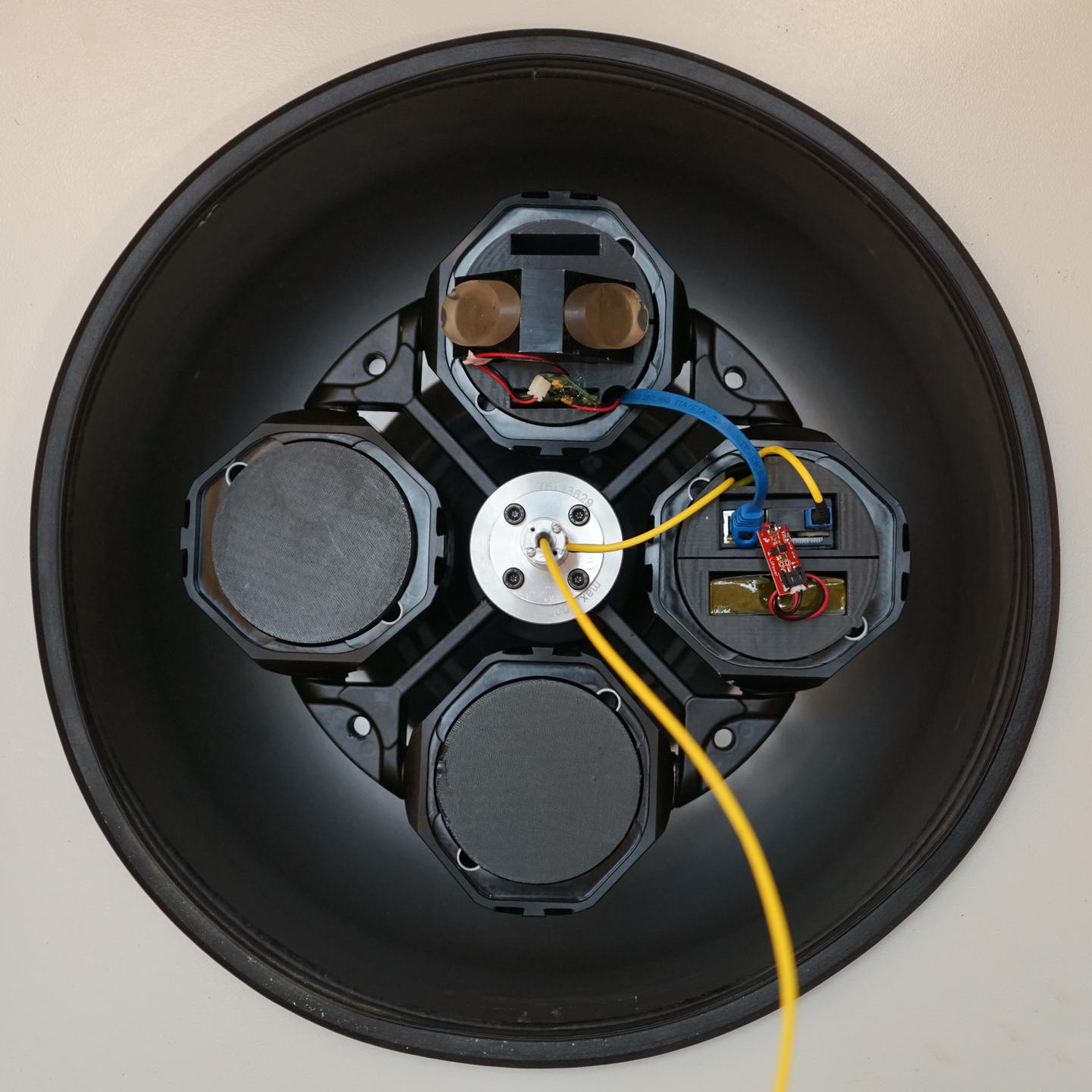 Miniaturized Centrifuge Force Microscope (CFM) design