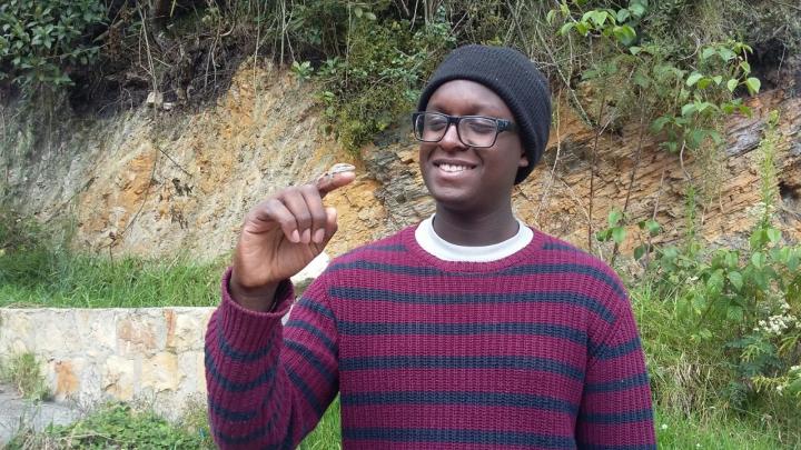 Jhan Salazar Holds an Anole