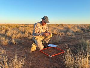 Professor David Eldridge studies herbivore dung on a field trip to Fowler's Gap