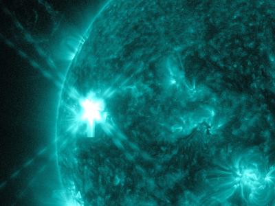 A Mid-Level Flare Erupted on the Left Side of the Sun on July 8, 2014