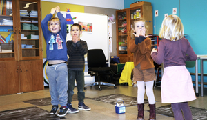 Children moving while learning sounds of letters