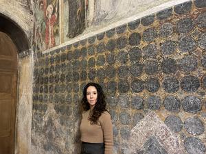 Dr Federica Gigante in front of the fresco