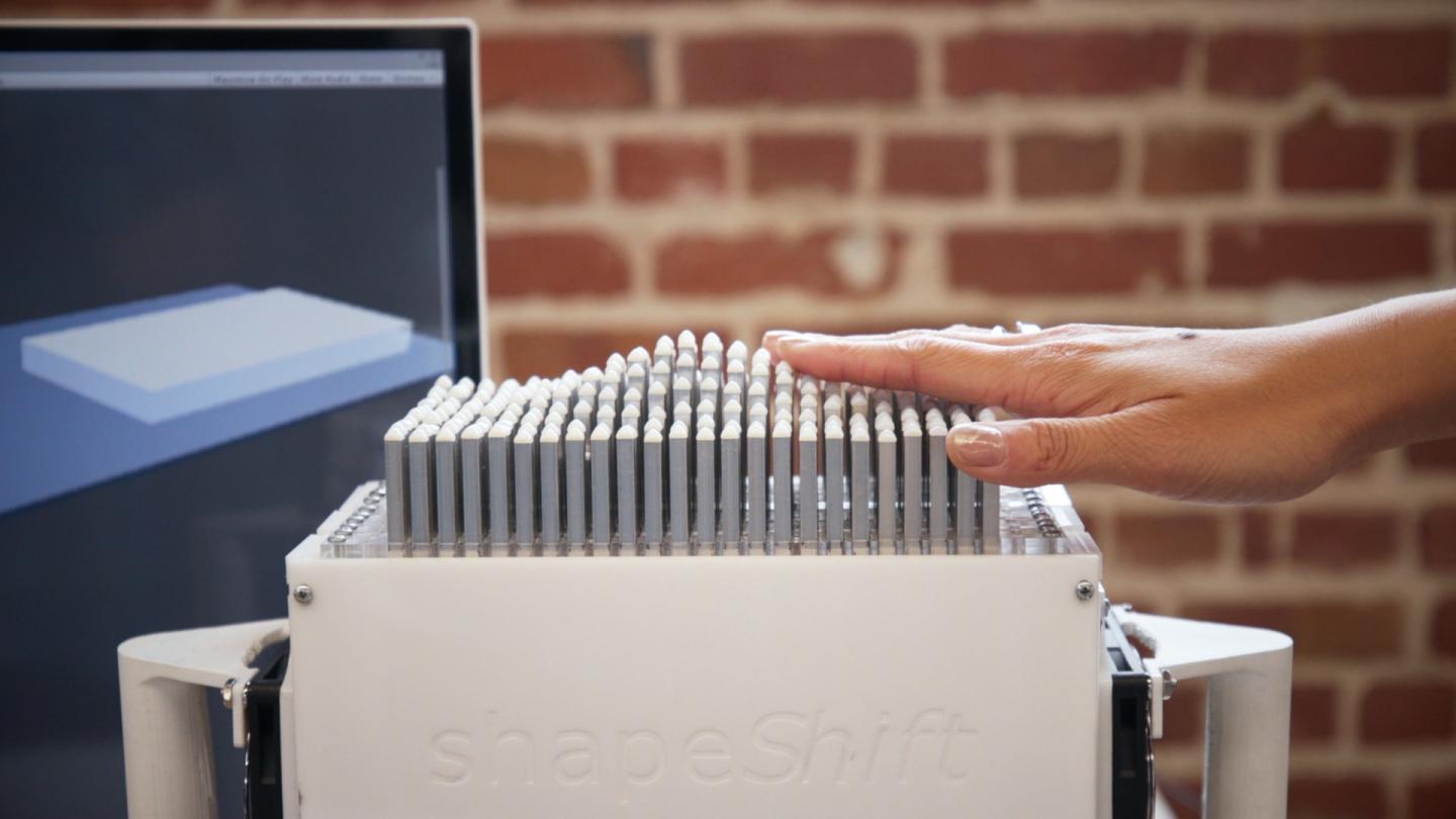 Hand Touching Tactile Display