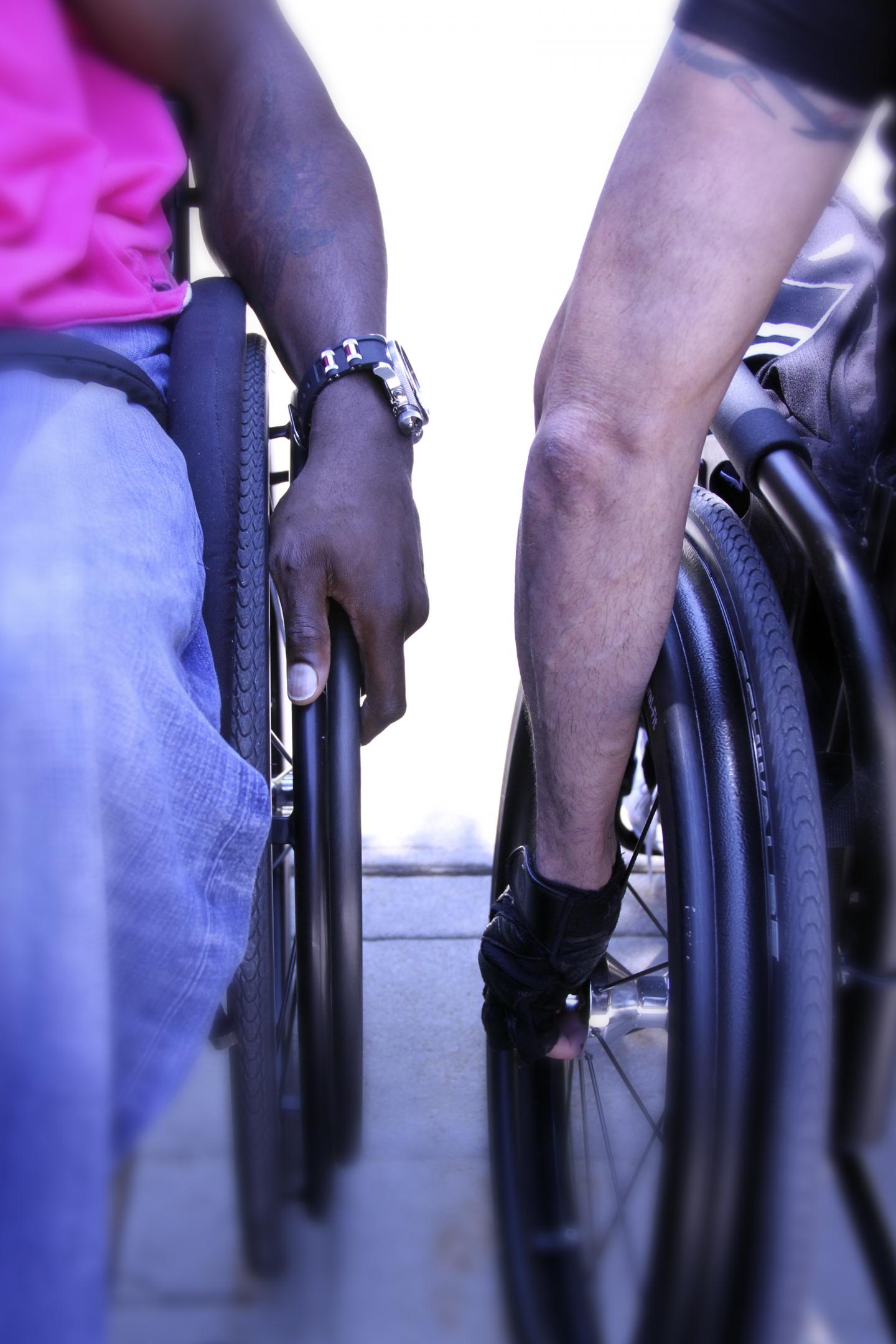 A pair of manual wheelchair users at Kessler Foundation.