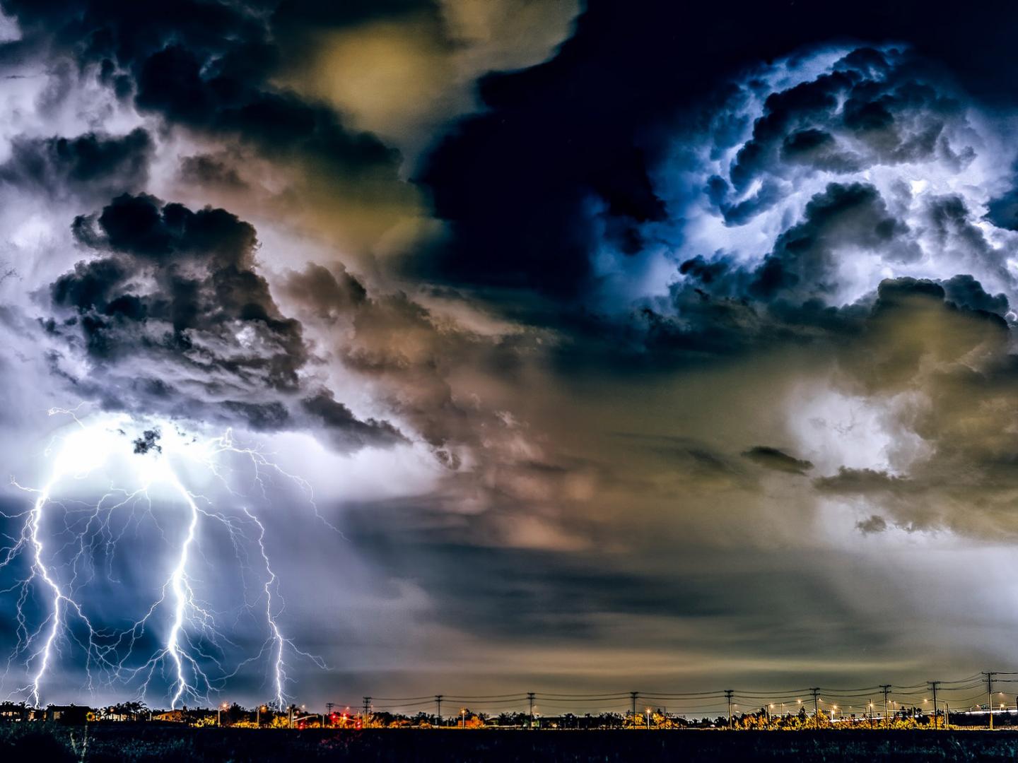 Thunderstorm stirs over a cityscape