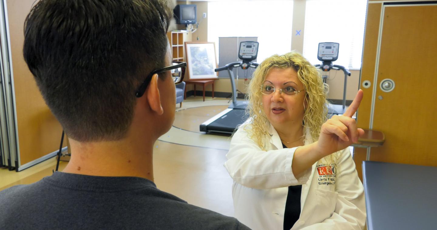 Linda Papa, M.D., Performs a Neurologic Exam