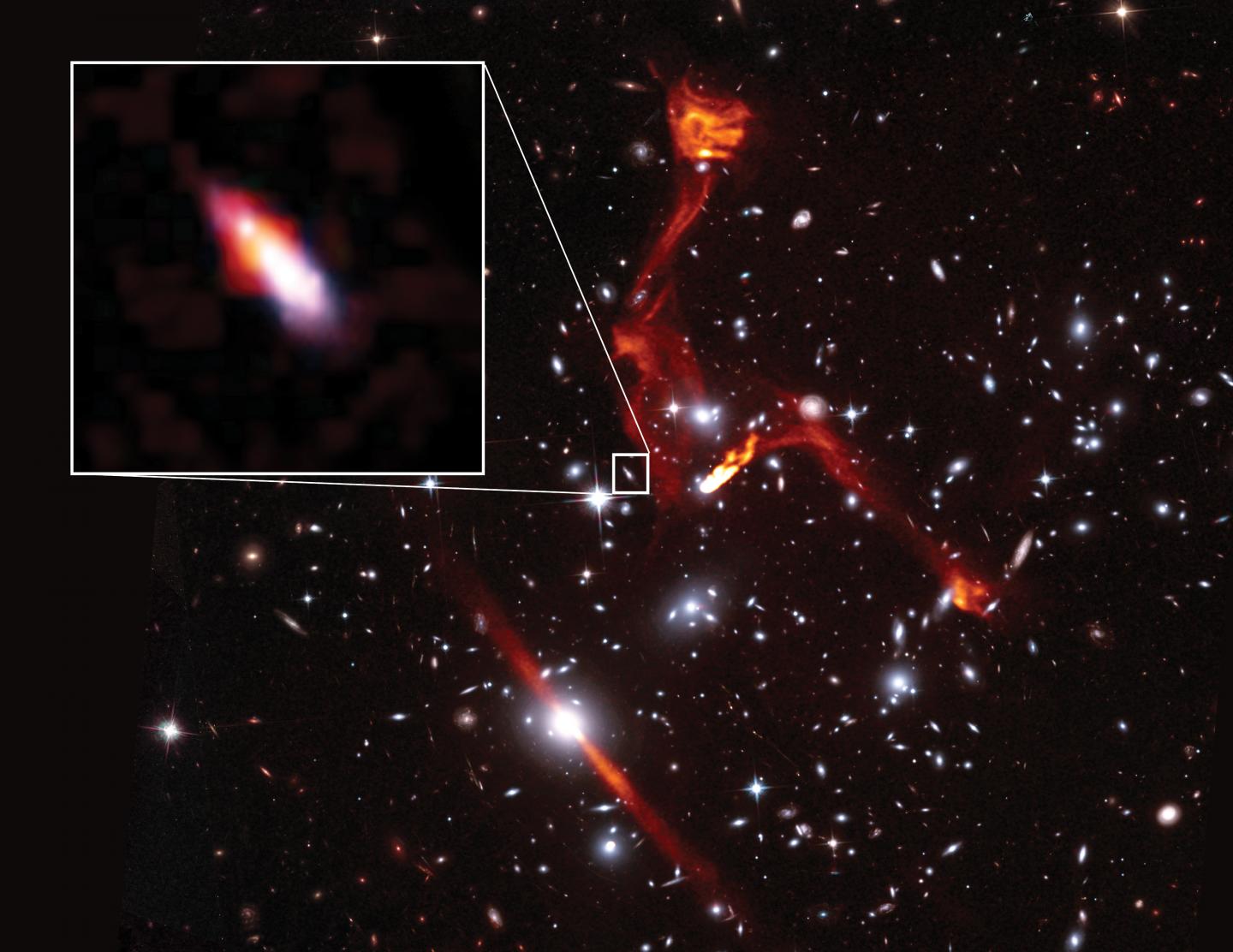 Cosmic Lens Reveals Faint Radio Galaxy