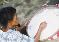 Agta Woman Preparing Rice