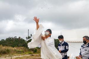 A Shinto priest performs purification rights