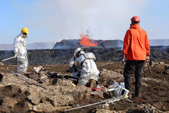 Scientists Collecting Volcanic Rock
