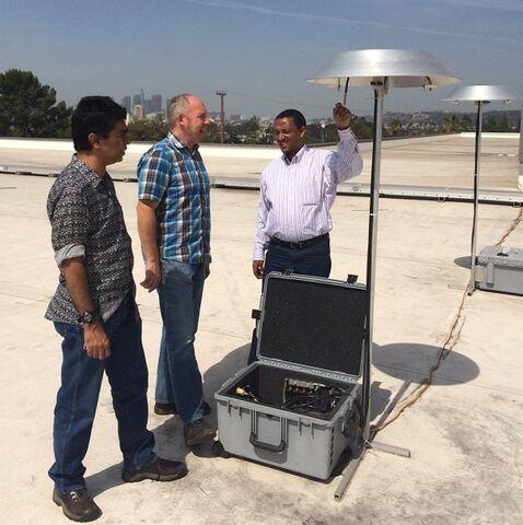 Scientists Use Device to Measure Air Quality on Rooftop