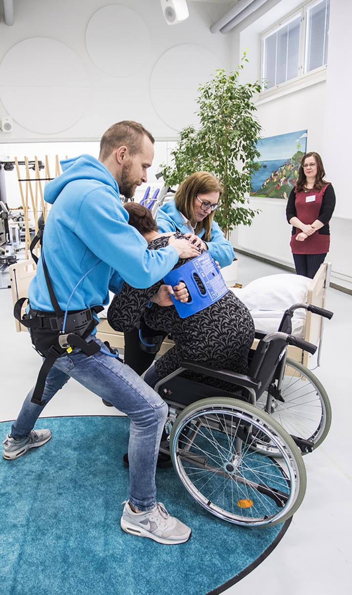 Nurses wearing exoskeletons to discover how the new technology would suit the special requirements of patient care.