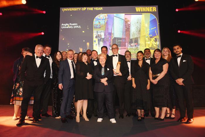 Times Higher Education University of the Year - ARU staff with Sandi Toksvig, who presented the awards