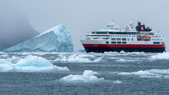 Merchant Ship Fram, an HX passenger ship, at Eqip Sermia, a glacier in Greenland