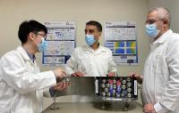 NTU Assoc Prof Alessandro Romagnoli and his team with the lab-scale prototype capsules for cold energy storage