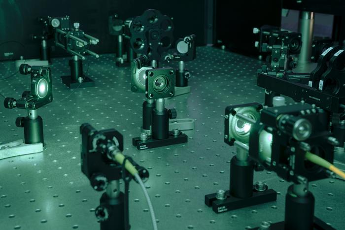 Optical laboratory setup for spin-photon-based quantum computing