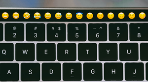 Emojis on a laptop keyboard