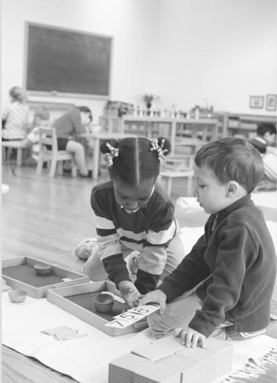 Children Working with Math Materials in a Montessori Classroom