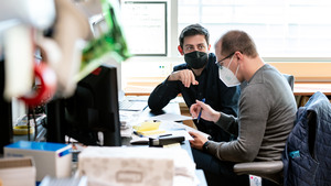 Gladstone scientists Zachary Steinhart and Ralf Schmidt