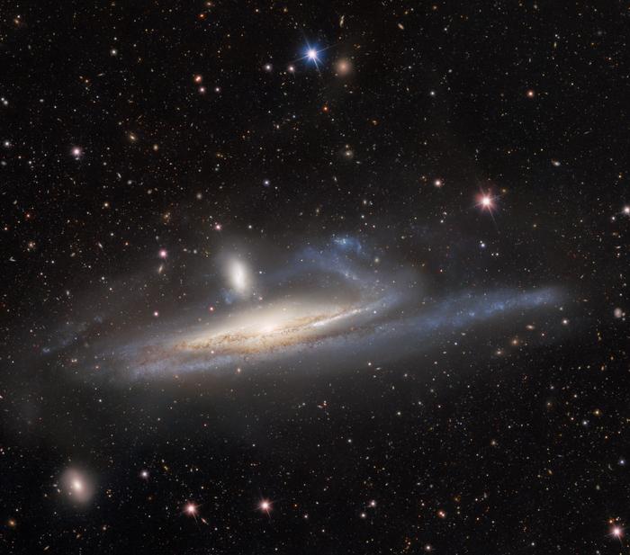 DECam Captures Galaxy Feasting on its Companion, a Prelude to Merger