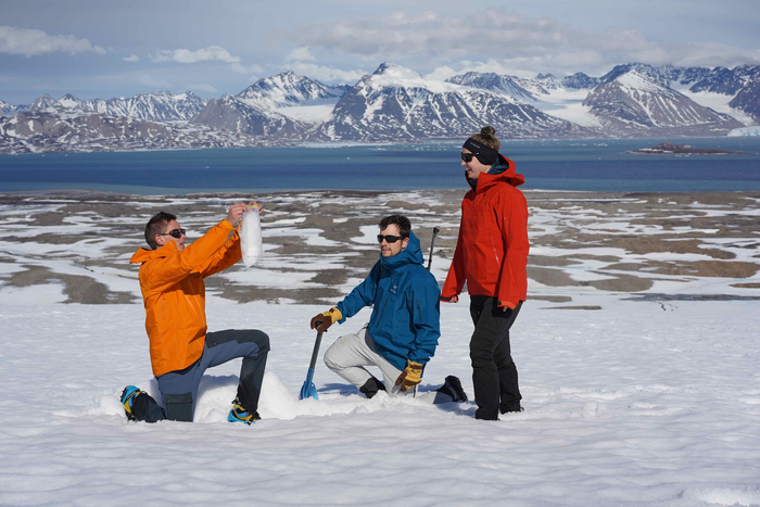 Researchers collection glacier surface samples
