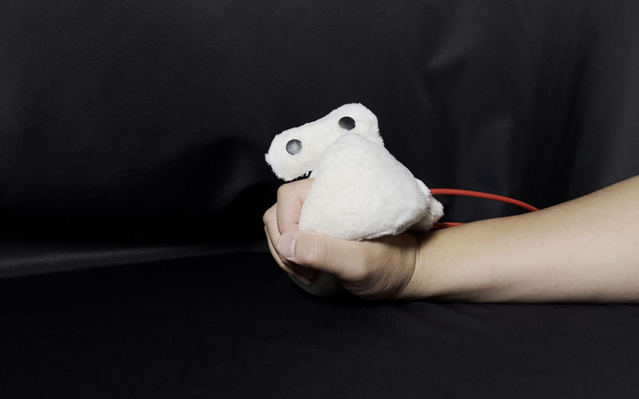 Inflatable hand-held soft robot