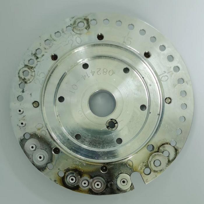 The cathode holder disk of the ion source of the HI-13 tandem accelerator