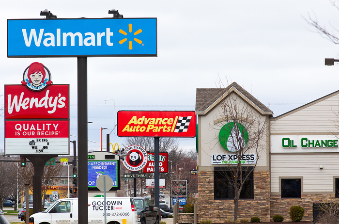 Retail signs along Duff Ave in Ames, IA, April 2022.